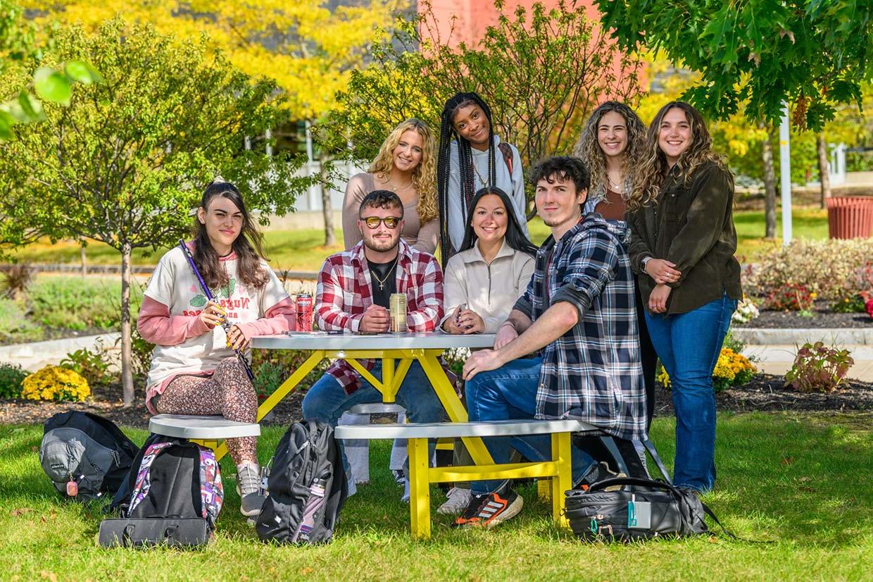 Group of students gathered on campus